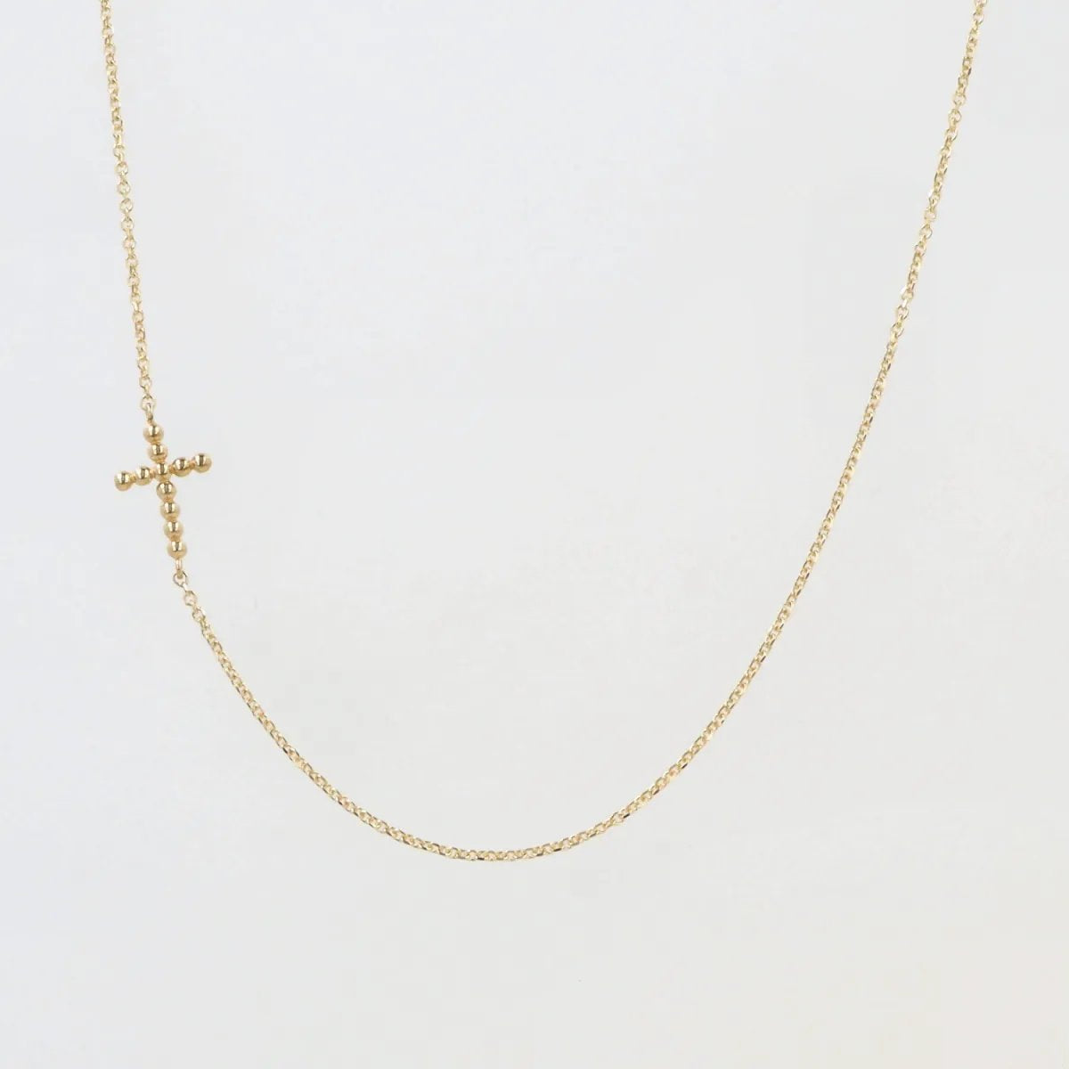 Lightweight yellow gold set with cross necklace and bracelet