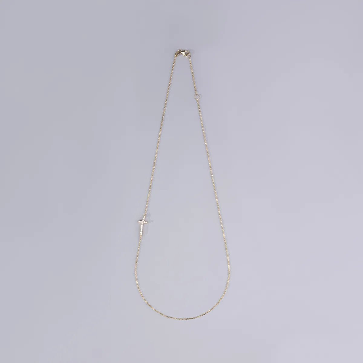 Yellow gold necklace with cross and cubic zirconia
