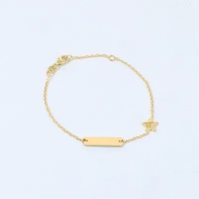 Yellow gold baby bracelet with tag and star