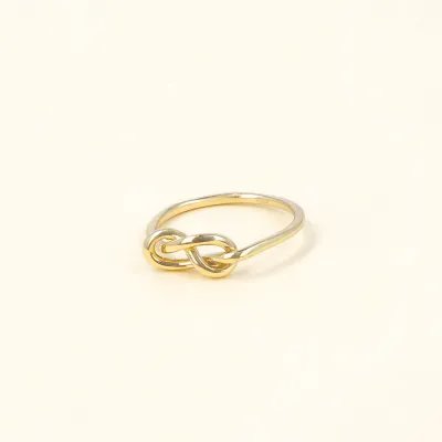 Yellow gold ring with knot