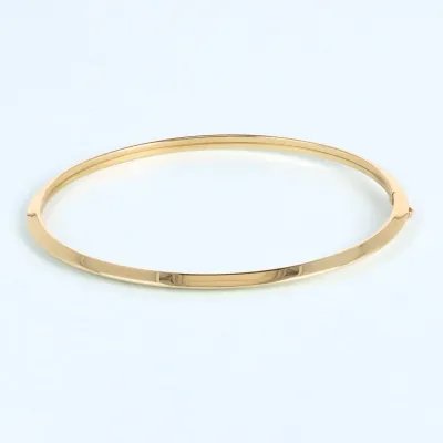 Yellow gold bangle with polish finish