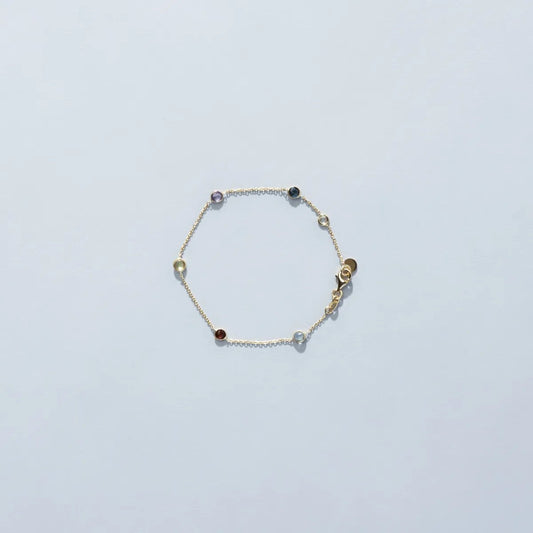 Yellow gold bracelet with natural stones