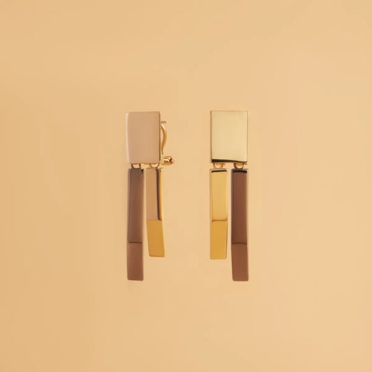 Yellow gold and black rhodium earrings from the "Futura" collection