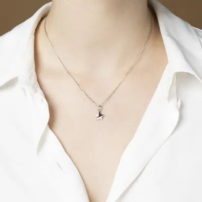 White gold star-shaped pendant with cubic zirconia
