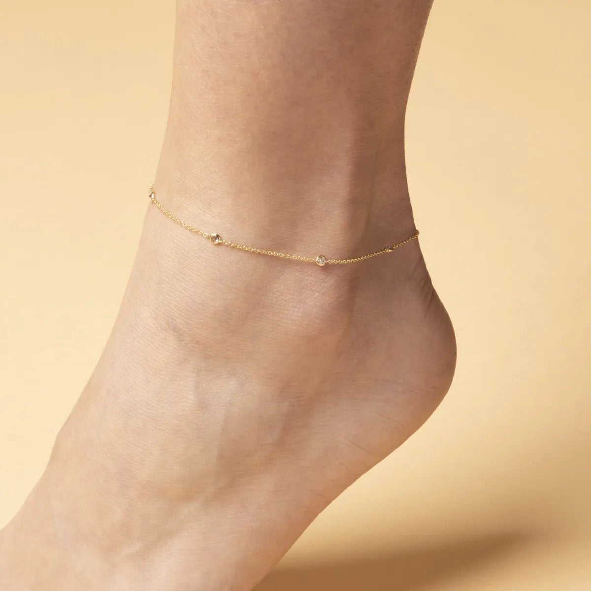 Yellow gold anklet with cubic zirconia