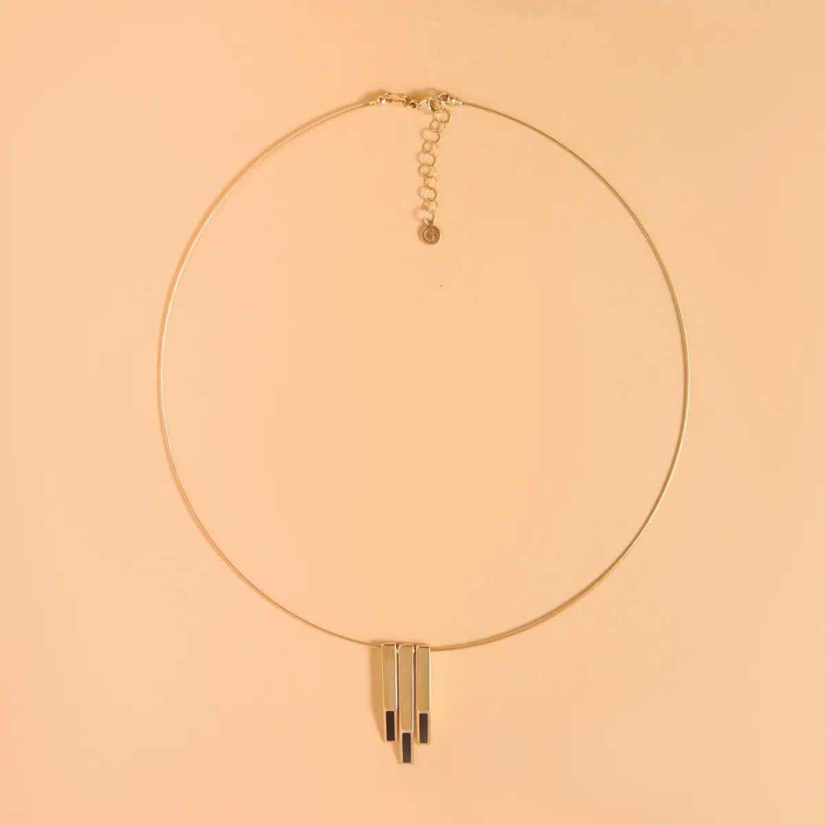 Yellow gold neklace with black enameled details from "Futura" collection