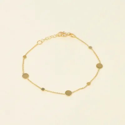 Lightweight yellow gold bracelet with shaped circles