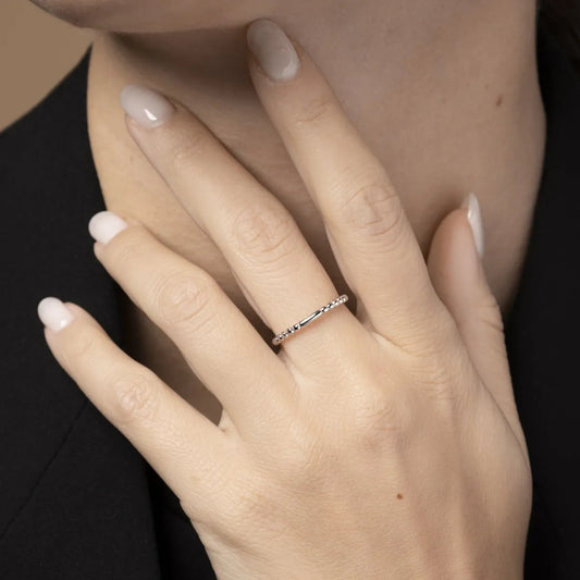 White gold ring with balls