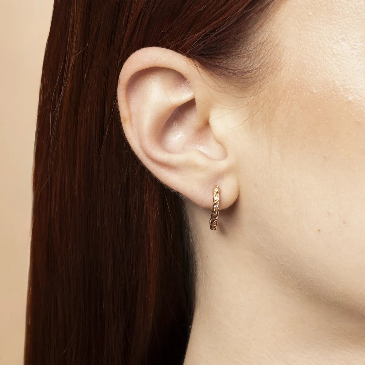 Rose gold round earrings with cubic zirconia