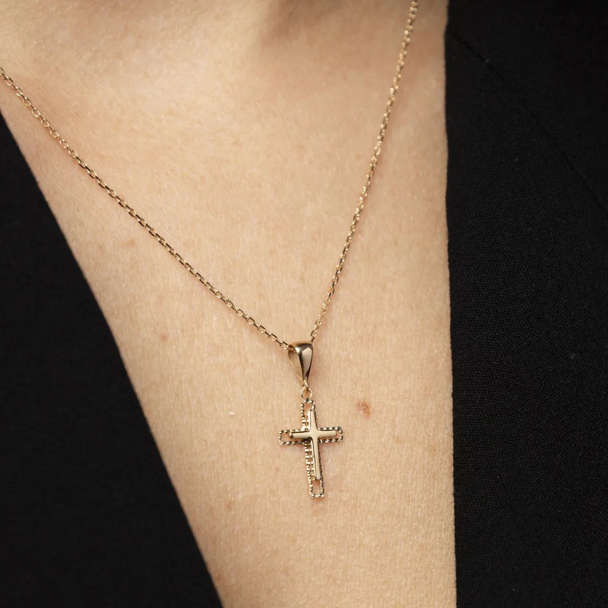 Yellow gold small cross pendant