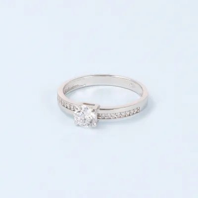 White gold ring with zirconia
