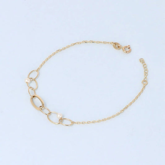 Lightweight set (bracelet and necklace) in yellow gold with pearls