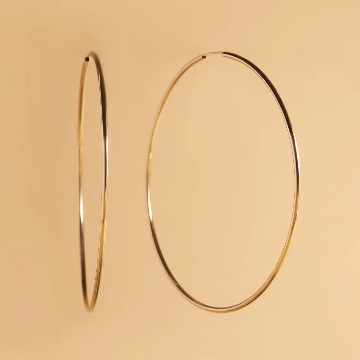 Yellow gold flex tube earrings 70 mm