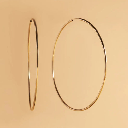 Yellow gold flex tube earrings 70 mm