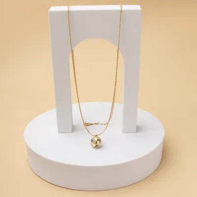 "WE" necklace with milk aquamarine