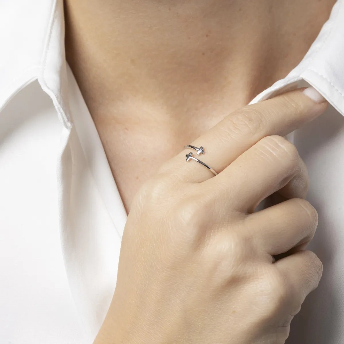 White gold ring with crosses