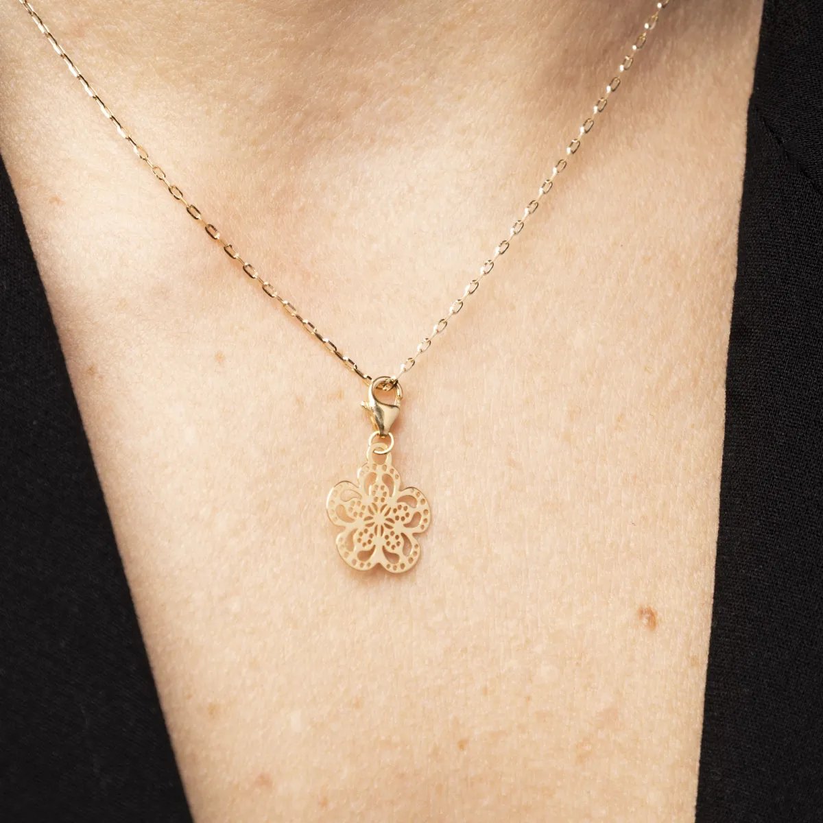 Yellow gold flower charm pendant