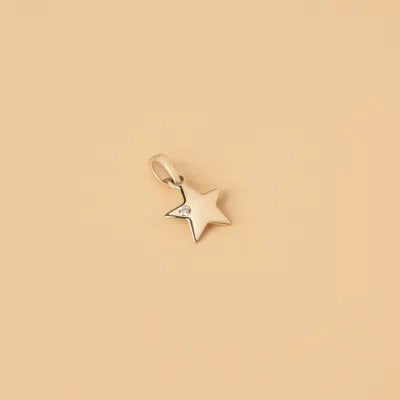 Yellow gold star-shaped pendant with cubic zirconia