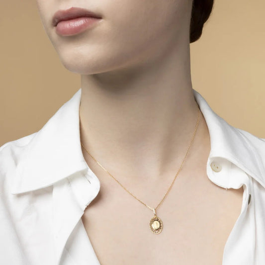 Yellow gold medal with Miraculous Madonna with cubic zirconia