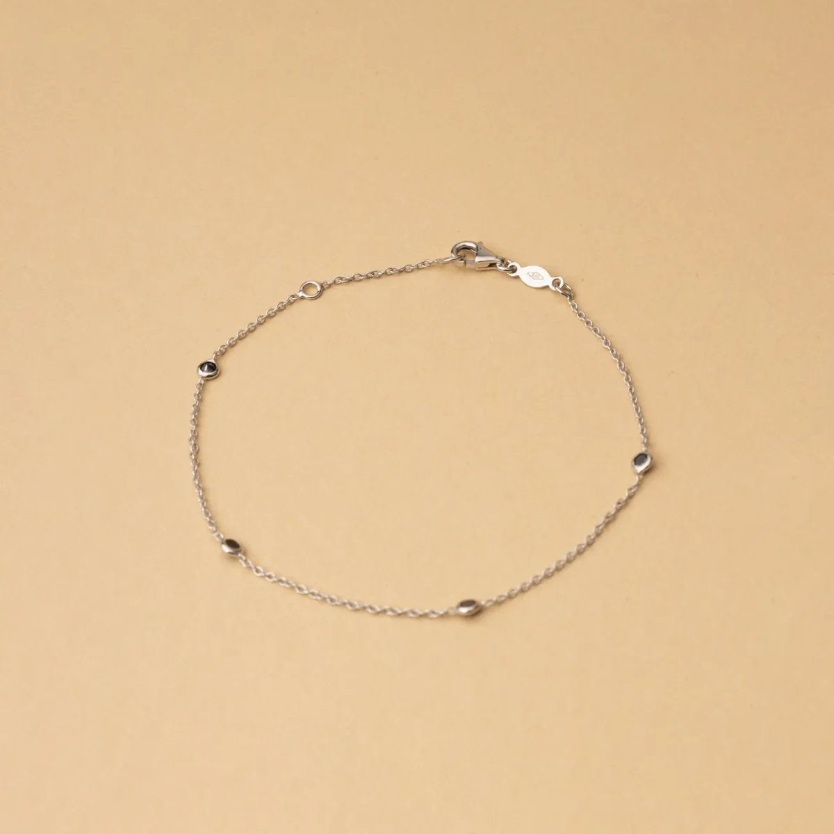 White gold bracelet with black cubic zirconia