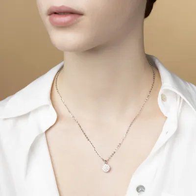 White gold rose-shaped necklace with cubic zirconia