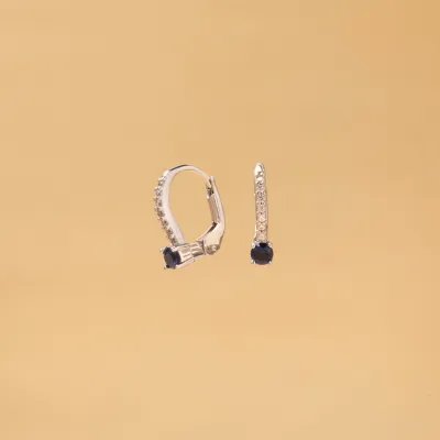 White gold monachella earrings with white and blue cubic zirconia