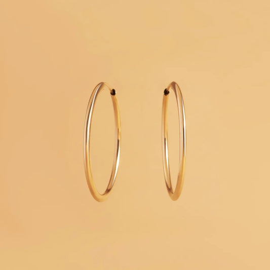 Yellow gold flex tube earrings 25 mm