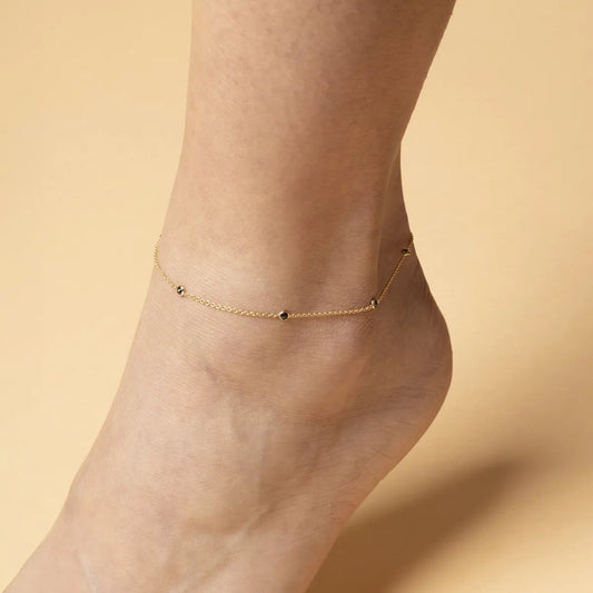 Yellow gold anklet with black cubic zirconia