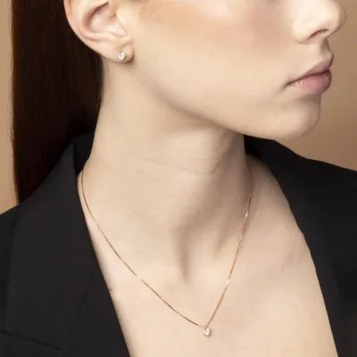 Rose gold solitare set with cubic zirconia: necklace and earrings