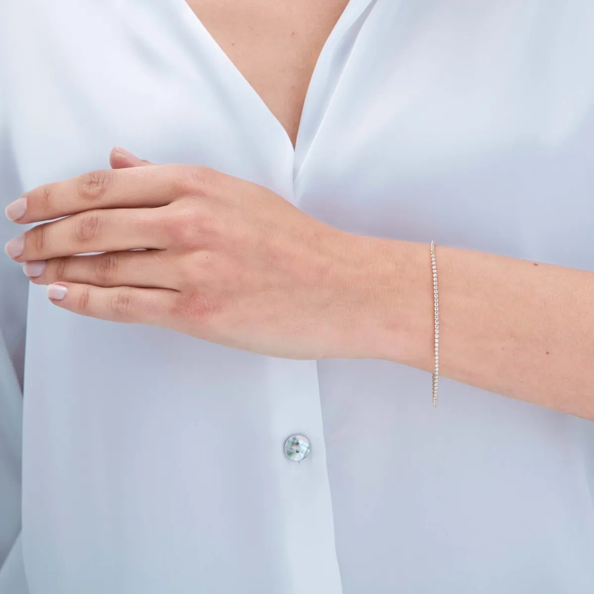 Yellow gold tennis bracelet with cubic zirconia