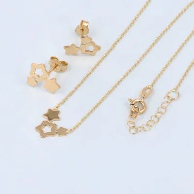 Lightweight yellow gold star-shaped necklace and earrings set