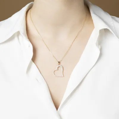 Yellow gold heart-shaped pendant with cubic zirconia