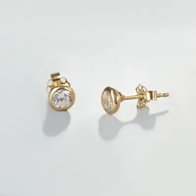 "Punto luce" earrings in yellow gold with zirconia