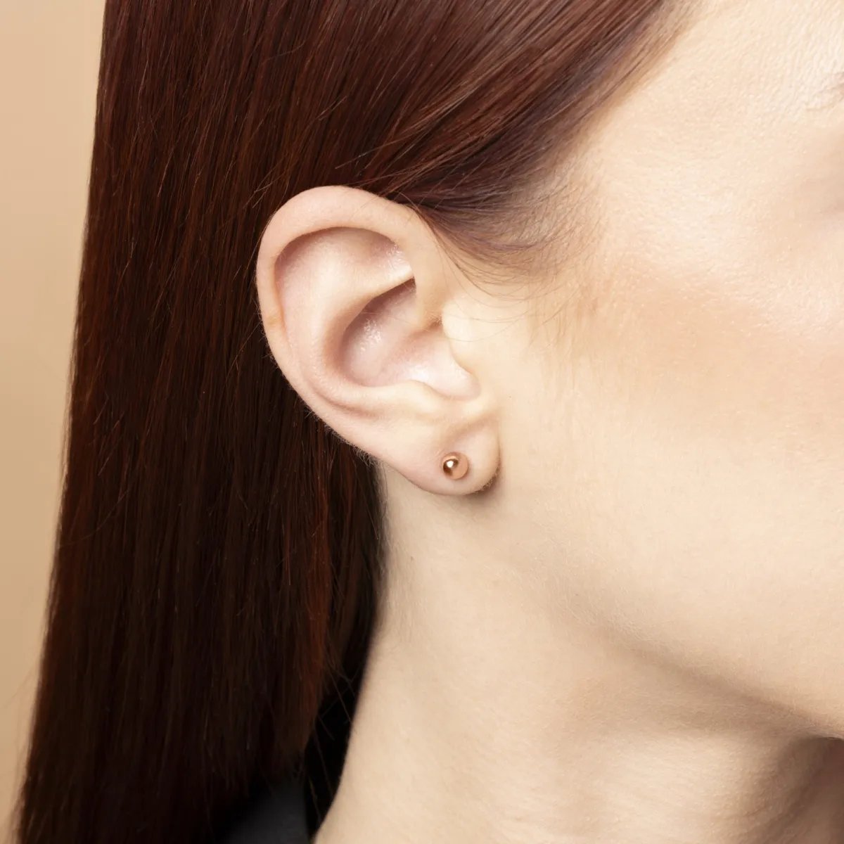 Rose gold sphere earrings