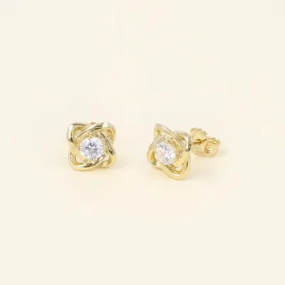 Yellow gold earrings with central zirconia
