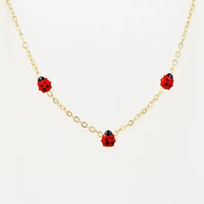 Yellow gold children's necklace with enameled ladybugs