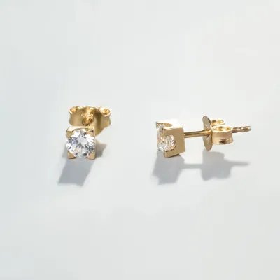 "Punto luce" earrings in yellow gold with zirconia