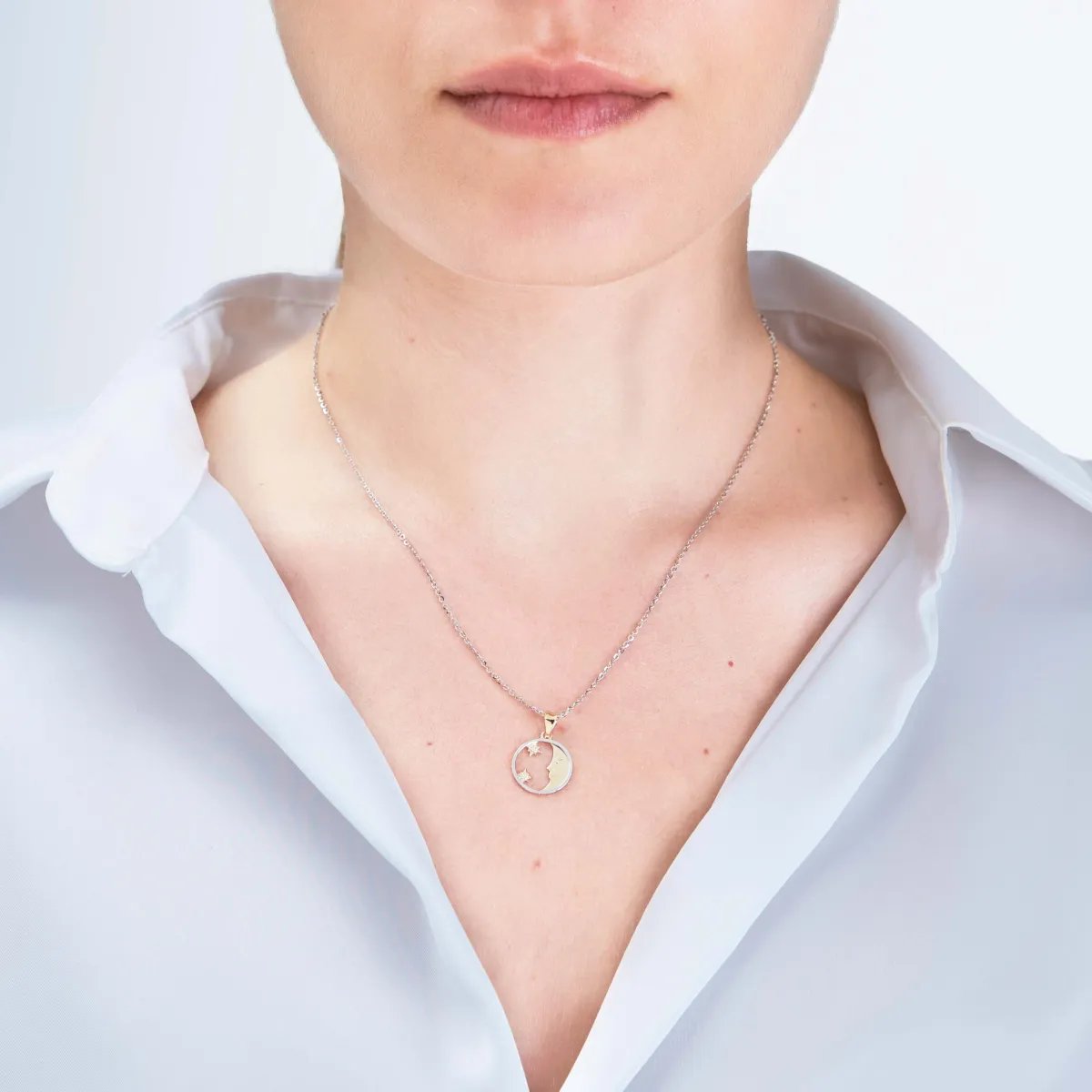 "Moon and stars" pendant in yellow gold