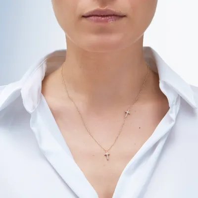 Yellow gold necklace with two crosses and zircons