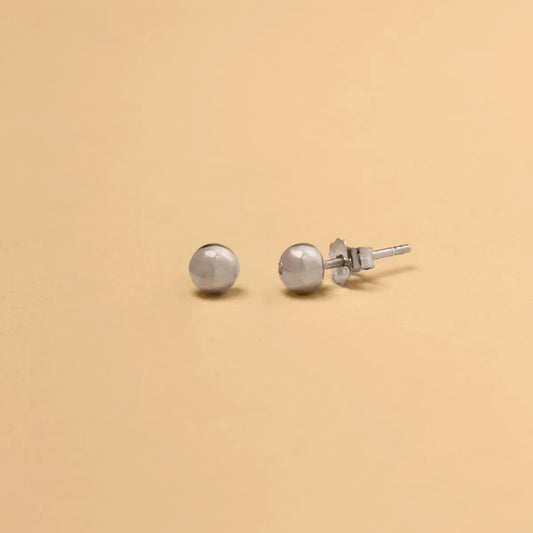 White gold half ball earrings without stones