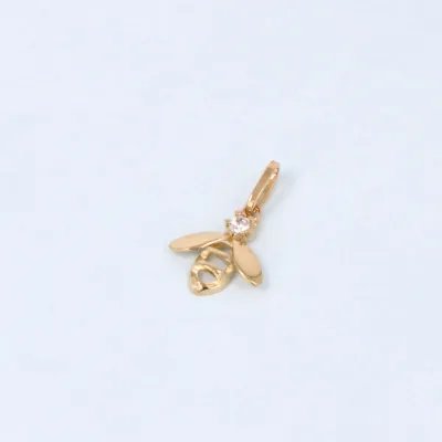 Lightweight yellow gold bee pendant with zirconia