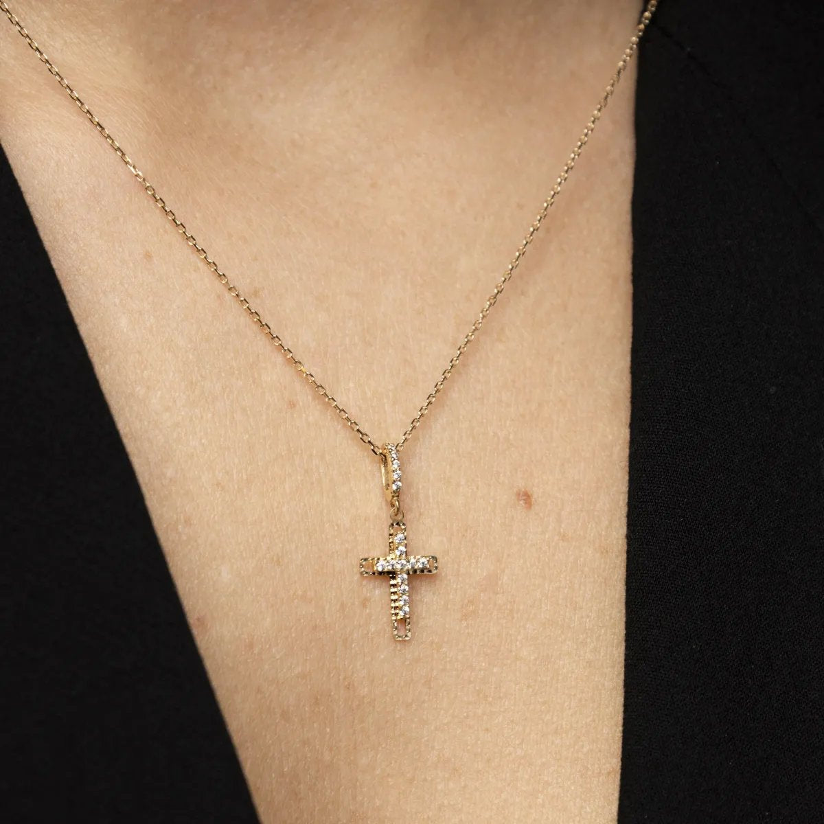 Yellow gold small cross pendant with cubic zirconia