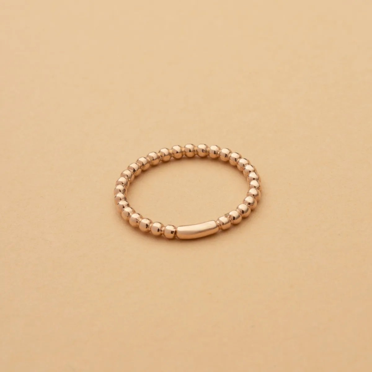 Rose gold ring with balls