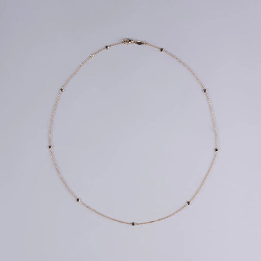Red gold necklace with black zirconia