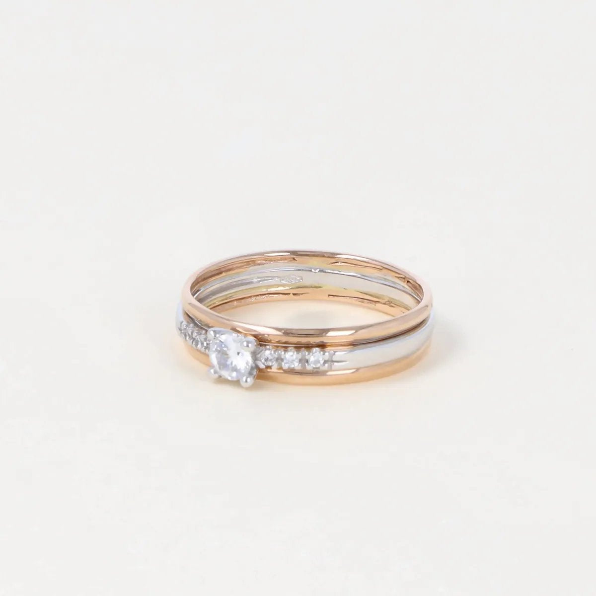 White and rose gold ring with zirconia