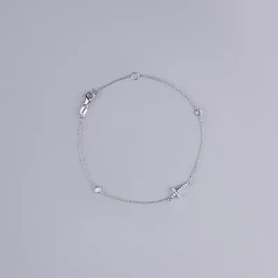 White gold bracelet with cross and cubic zirconia