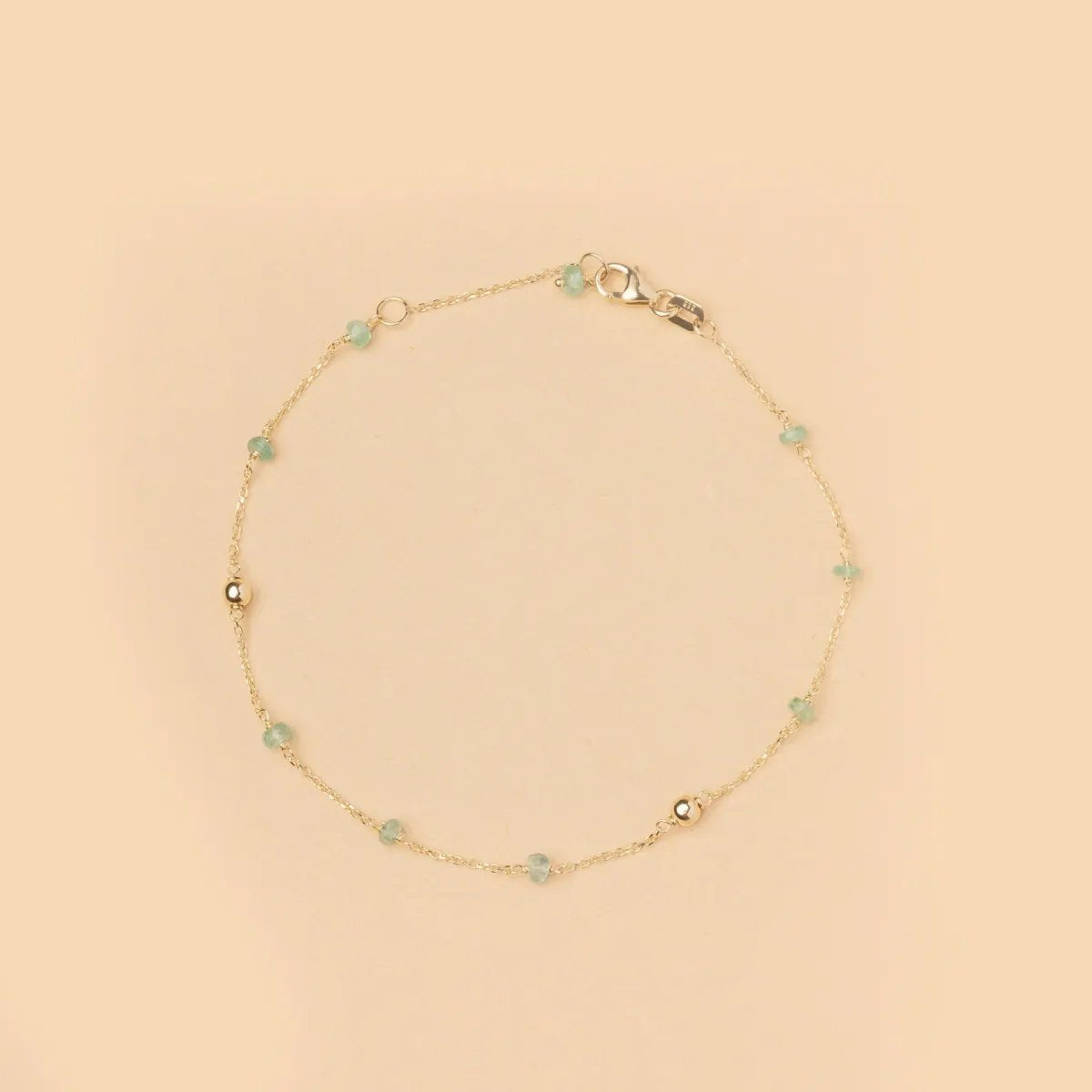 Yellow gold bracelet with natural stones in three color versions