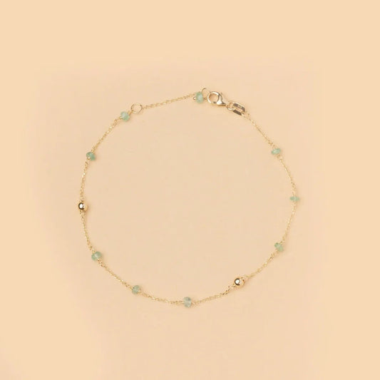 Yellow gold bracelet with natural stones in three color versions