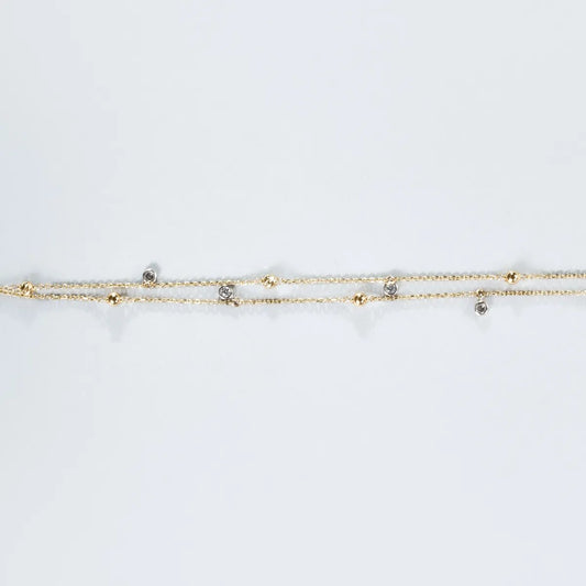 Yellow and white gold bracelet with zirconia