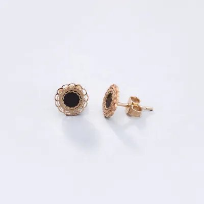 Yellow gold and onyx paste earrings